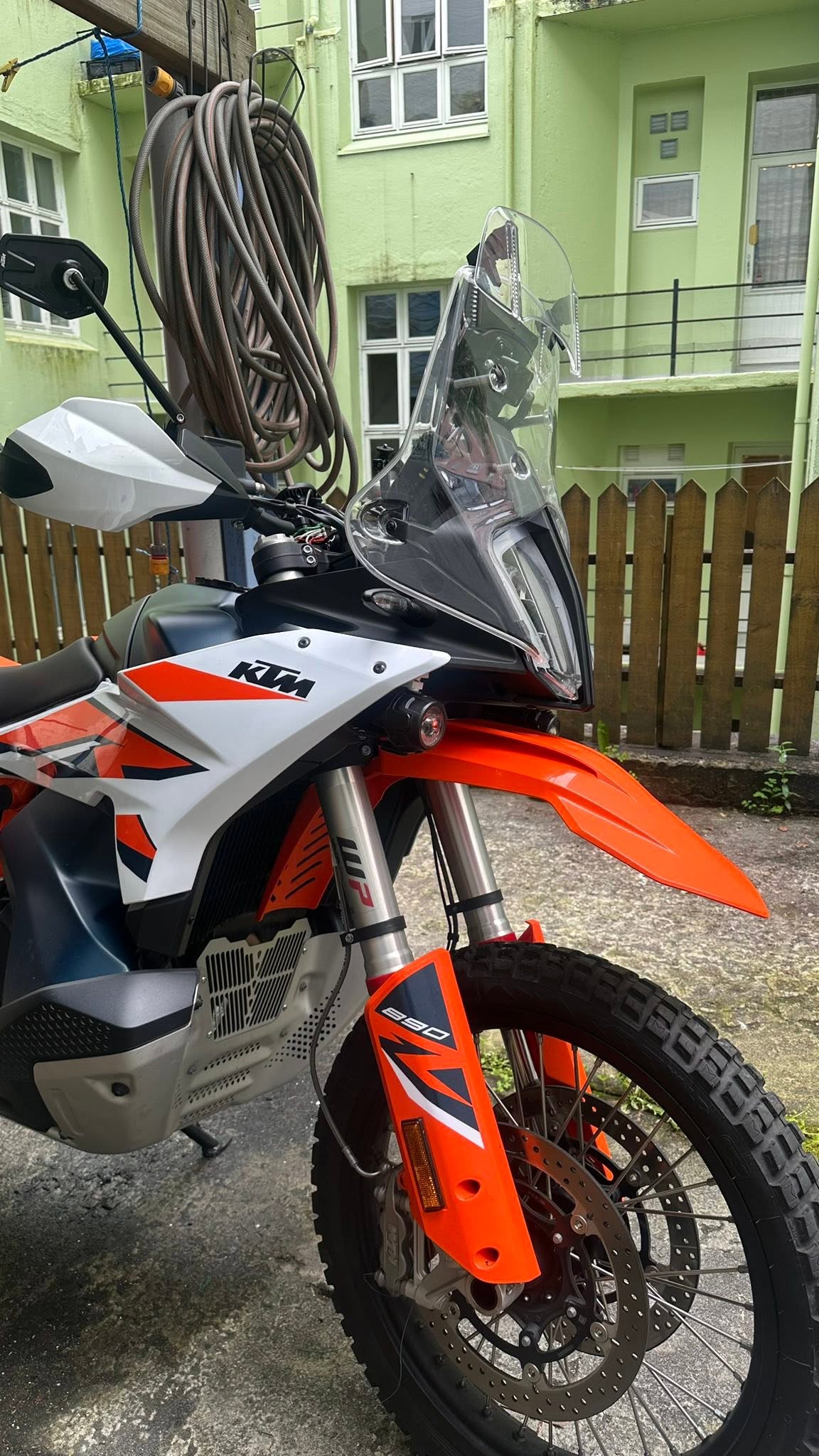 3D-printed spotlight mount mounted on a KTM 890